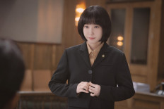 This undated handout image obtained on September 1, 2022 from Netflix in Seoul shows South Korean actress Park Eun-bin playing a role of the high-functioning autistic lawyer Woo Young-woo in K-drama 'Extraordinary Attorney Woo'.