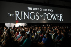 In this file photo taken on July 22, 2022 Fans attend 'The Lord of the Rings: The Rings of Power' panel in Hall H of the Convention Center during Comic-Con International on July 22, 2022 in San Diego, California.