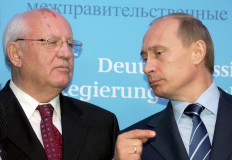 In this file photo taken on December 21, 2004 Russian President Vladimir Putin (right) talks to former Soviet President Mikhail Gorbachev (left) prior to a joint press conference of German Chancellor Gerhard Schroeder and Putin at Gottorf castle in Schleswig. Mikhail Gorbachev, who changed the course of history by triggering the demise of the Soviet Union and was one of the great figures of the 20th century, died in Moscow on August 30, 2022 aged 91. 
