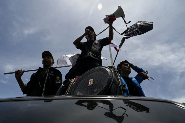 University students protest against the price of gasoline in front of the people's representative council in Banda Aceh on Sept. 5. 
