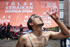 Protesters gather to show their displeasure at a gasoline price hike, outside of the House of Representatives building in Jakarta on Sept. 6. 
