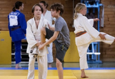 Brothers Danylo (L) and Denys Titkov participate in their judo practice in Vienna, Austria on September 1, 2022. After months of anguish and hesitation, the Titkov family -- who fled to Vienna from Ukraine just after Russia invaded -- have finally decided to stay. AFP is following the refugee family from Irpin, one of the suburbs of Kyiv that saw the worst of the fighting in the early weeks of the war, over the course of the first year of their new life in a land where a quarter of the population are immigrants.
