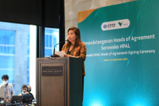 CEO Febriany Eddy addressing the crowd before signing the Heads of Agreement at Park Hyatt Hotel on Tuesday (13.09).