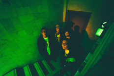 Textile-school connections: CJ1000 -- consisting of Muhammad Fardlan Hakim (vocals-left), Fattah Abdul Malik (guitar), Rangga Widya Putra (bass guitar) and Muhamad Naufal Jordie (drums-right) -- includes their friends from campus to fill in gang-shout tracks and seniors from the theater club to play cameos in their music videos. (Courtesy Davin Elka A)