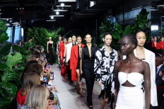 Resort-inspired: Models present creations from the Michael Kors spring/summer 2023 collection during New York Fashion Week in Manhattan, New York, the United States, on Wednesday. 