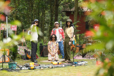 Musical connections: Rafipandito Boler (left), Rizky Aditya (second left), Janu Rahadi (second right) and Gemilang Ramadhan during Kalabiru's prerecorded live session at Pawaka Valley, South Sentul, West Java. (Courtesy of Strangest Records)