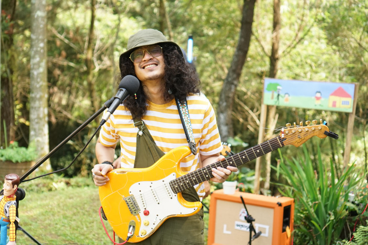 No idle hands: Guitarist-slash-vocalist Gemilang Ramadhan usually created the band's cover artworks and visual assets before his meeting with Faiz Aditya during a rehearsal session for 'Robotanica'. Both their works are heavily influenced by English visual artist Roger Dean, famously known for his works for English progressive band Yes. (Courtesy of Strangest Records)