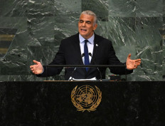 Israel's Prime Minister Yair Lapid addresses the 77th session of the United Nations General Assembly at the UN headquarters in New York City on September 22, 2022. 

