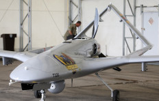 A Turkish Bayraktar TB2 combat drone is on view during a presentation at the Lithuanian Air Force Base in Siauliai, Lithuania, on July 6, 2022.