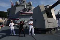 US Vice President Kamala Harris (center) prepares to meet with members of the US Navy during her visit onboard USS Howard at the naval base in Yokosuka, Kanagawa Prefecture on September 28, 2022.
