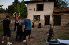 Behind the scene: Members of the crew and actors work on Forbidden Wedding during filming in Buyukorhan, in the outskirts of Bursa, Turkey, on Sept. 1.