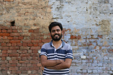 Naman Gupta, founder of Code Effort, a company that recycles cigarette butts, poses for a picture at his factory in Noida, India September 12, 2022.