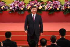 Center of attention: China's President Xi Jinping leaves the podium following his speech in Hong Kong after a ceremony to inaugurate the city's new leader and government on July 1, 2022, on the 25th anniversary of the city's handover from the United Kingdom to China. 