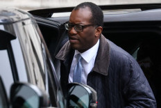 Chancellor of the Exchequer Kwasi Kwarteng exits a car on Downing Street in London, Britain, October 14, 2022. 
