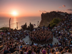 Ritual showcase: Dancers perform the traditional kecak dance at Pura Luhur Uluwatu in Pecatu, Bali. (Unsplash/Mauro Fabio Cilurzo)