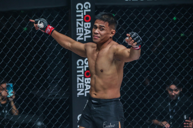 Indonesian MMA fighter Eko Roni Saputra emerges victorious at ONE 162 on Friday in Kuala Lumpur as he submits Yodkaikaew Fairtex of Thailand in the first round. 