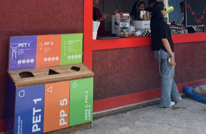 Waste drop-off bins are installed at partnering coffee shops around the city of Malang to encourage people to sort their trash, during the CE-YOU Tomorrow event