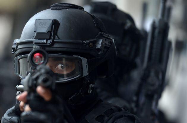 Sights set: An Indonesian Military (TNI) soldier takes part in a counterterrorism drill on Oct. 20 in Sanur, Denpasar, Bali. The TNI and National Police will deploy personnel to maintain security during the Group of 20 Summit in Bali next month.
