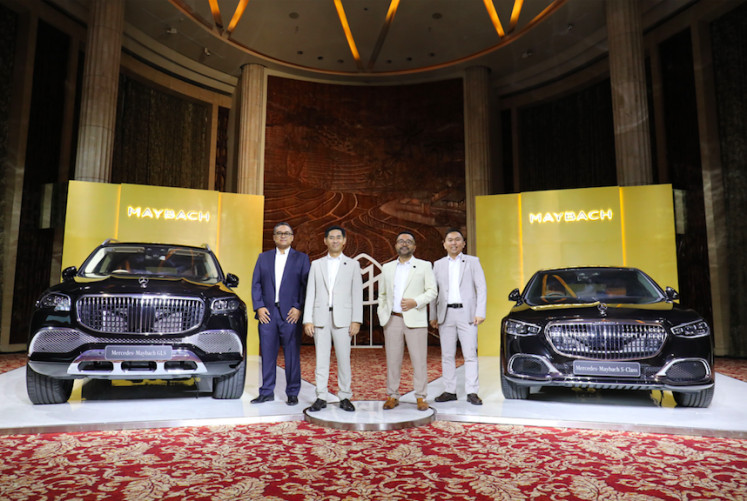 New series: Hari Arifianto (left), Deputy Director of Sales, Operations and Product Management of Mercedes-Benz Indonesia, Choi Duk Jun (second from left), Deputy Director of Marketing Communications and Public Relations Kariyanto Hardjosoemarto (second from right) and Deputy Director for Customers services Brea Adi Sarsa poses during the launch of the Mercedes-Maybach GLS and S-Class October 26 at the Kempinski Hotel, Jakarta.