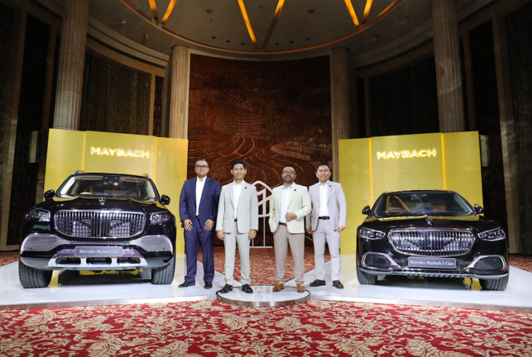 New series: Deputy Mercedes-Benz Indonesia's director sales, operation and product management Hari Arifianto (left), president director Choi Duk Jun (second left), deputy director of marketing communication and public relations Kariyanto Hardjosoemarto (second right) and deputy director of customer services Brea Adi Sarsa pose during the launch of the Mercedes-Maybach GLS and S-class on Oct 26 at Kempinski Hotel, Jakarta.