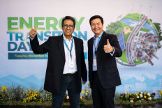 MMP representative Achmad Zuhraidi (left) and Mitra Informatika Gemilang (MIG) CEO Tedy Harjanto.