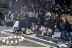 Candlelight vigils mourn South Korea Halloween disaster victims