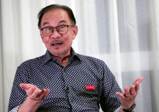 Malaysian opposition leader Anwar Ibrahim speaks during an interview with Reuters in Tambun, Perak, Malaysia, on Nov. 4, 2022.