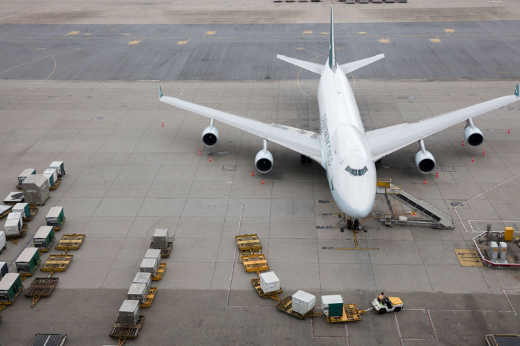 A Cathay Pacific 747 freighter stands on the apron of an airport in this undated photograph.