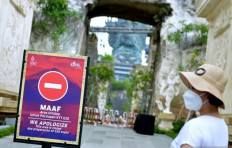A sign announces the temporary closure of the Garuda Wisnu Kencana (GWK) Cultural Park in Badung, Bali, on Nov. 3, 2022. Bali is hosting the Group of 20 Leaders’ Summit 2022 on Nov. 15-16.