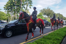 Members of the Indonesian mounted police patrol the streets near the venue of the G20 Bali Summit in Nusa Dua, Bali on November 12, 2022. 
