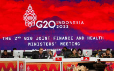 Finance Minister Sri Mulyani Indrawati (2nd-right) delivers a speech during the G20 Finance and Health Ministers meeting in Nusa Dua, Bali 12 November 2022. 
 (AFP/Ade Nagi).
Usage: 0