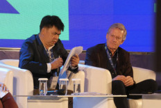 Thanapol Eawsakul (left), publisher at Thailand’s Same Sky press -- winner of this year’s IPA Prix Voltaire -- onstage on Nov. 10 with Kristenn Einarsson, chair of the IPA’s Freedom to Publish committee and chief of the Norway-based World Expression Forum, WEXFO. 