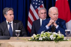 US President Joe Biden (right) sits next to US Secretary of State Antony Blinken (left) during a trilateral meeting with Japanese Prime Minister Fumio Kishida and South Korean President Yoon Suk-yeol on the sidelines of the East Asia Summit during the 40th and 41st Association of Southeast Asian Nations (ASEAN) Summits in Phnom Penh on November 13, 2022. 
