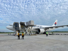 A Malaysian Airlines Airbus A330 cargo aircraft unloads the equipment and logistics for the 2022 World Superbike at the Zainuddin Abdul Madjid Lombok International Airport in Lombok, West Nusa Tenggara on Nov. 1, 2022.