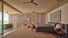 Luxury villas: Brazilian architect Marcio Kogan designed the resort architecture to complement the nature surrounding the Fari Islands. The villas feature glass walls to give guests a sense of floating. (Courtesy of Patina Maldives) 