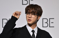 On the frontline: South Korean K-pop boy band BTS member Jin poses for a photo session during a press conference on BTS album BE (Deluxe Edition) in Seoul on Nov. 20, 2020. Jin will begin his military service on Dec. 13, and will be deployed to a frontline unit, local media reported on Thursday.
