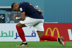 France's forward #10 Kylian Mbappe celebrates scoring his team's second goal during the Qatar 2022 World Cup Group D football match between France and Denmark at Stadium 974 in Doha on November 26, 2022. 

