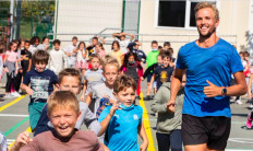 Run for the planet: French marathon runner Nicolas Vandenelsken (right), who calls himself an “eco-adventurer,“ is seen running with some children in a photo posted on Twitter account @UniVertSport, an association aiming to raise awareness on sport, planet and health.