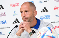 USA's coach Gregg Berhalter gives a press conference at the Qatar National Convention Center (QNCC) in Doha on November 28, 2022, on the eve of the Qatar 2022 World Cup football match between Iran and USA. 
