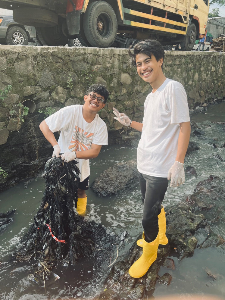 Making a change: The Pandawara Group posts their cleaning activities on TikTok to raise awareness on how polluted the rivers in Bandung are. To their surprise, their videos went viral and inspired others to care about the environment. (Courtesy of Pandawara Group)