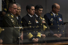 Representatives of the Peruvian Armed Forces attend the swearing ceremony of Dina Boluarte as Peru's new President at the Congress in Lima, on December 7, 2022, following the destitution of former President Pedro Castillo. 