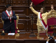 Peruvian Dina Boluarte (right) greets members of the Congress after being sworn in as the new President hours after former President Pedro Castillo was impeached in Lima, on December 7, 2022. 