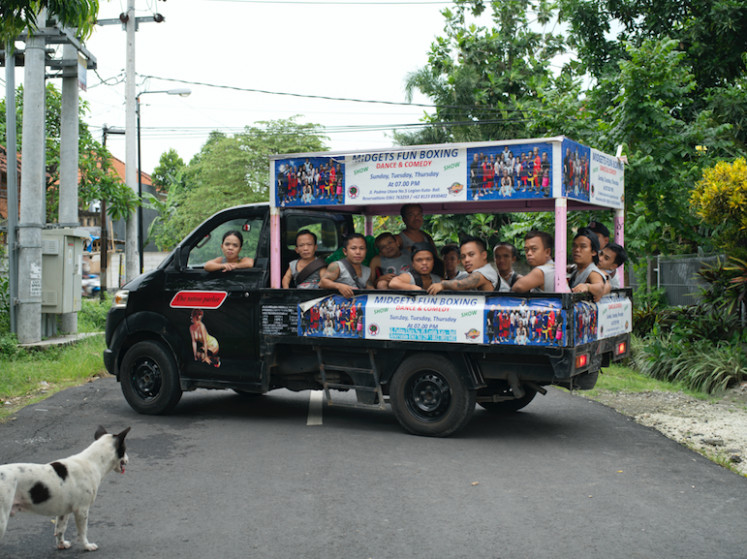 Hear their story: The dwarf community is pictured in their open pick-up truck, which Ted van der Hulst happened upon in a Kerobokan traffic jam in 2017. (Courtesy of Ted van der Hulst)