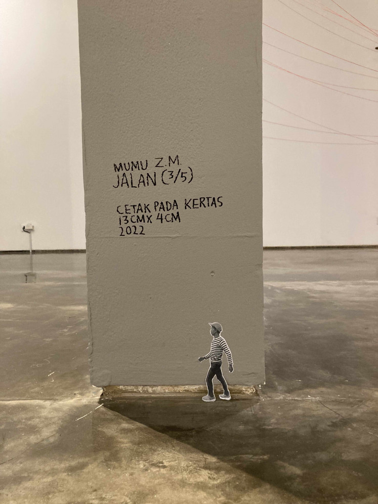 Standing small: Mumu Zainal Mutaqin's series-of-five artwork, “Jalan” (2022), can be found around the exhibition—sometimes well hidden. (JP/Anindito Ariwandono)