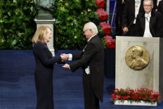 French writer Annie Ernaux is awarded with the Nobel Prize in Literature 2022 by King Carl XVI Gustaf of Sweden during the Nobel Prize award ceremony at the Concert Hall in Stockholm, Sweden on December 10, 2022. 
