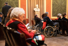 Spectators in wheelchairs attend a concert specifically tailored to people living with dementia at the Wiener Musikverein in Vienna on December 5, 2022. The gilded columns of Vienna's grand old Musikverein are now home to concerts where something very different happens -- where older people, often living with dementia, can let it all hang out and just go with the music.
