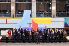 Regroup: European Union and ASEAN leaders pose for a family photo at a commemorative summit in Brussels on Dec. 14, 2022. 