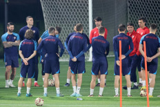 Croatia's coach Zlatko Dalic (2nd-right) speaks to his players during a training session at Al Erssal Training Site 3 in Doha on December 16, 2022, on the eve of the Qatar 2022 World Cup third place football match between Croatia and Morocco. 
