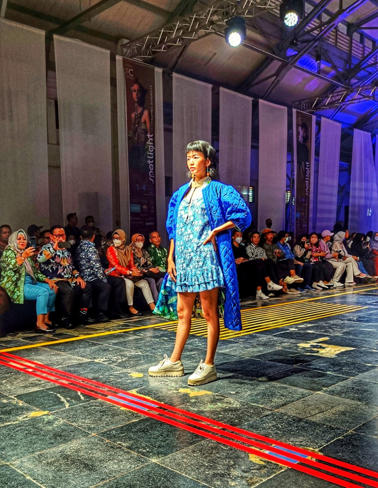 On the catwalk: A model presents a peplum dress and quilted overcoat by Jenny Yohana Kansil, during the fashion event Spotlight in Pos Bloc, Jakarta, on Dec. 3. (JP/Sylviana Hamdani) 