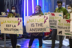 Climate activists hold a rally on Dec. 16, 2022 during the United Nations Convention on Biological Diversity (COP15) in Montreal, Canada.